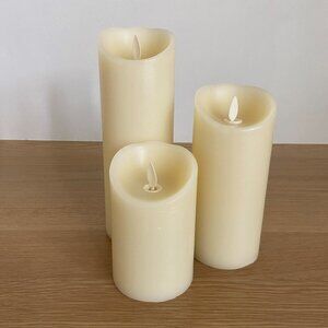 Three Ivory Flameless Luminara Pillar Candles with Remote